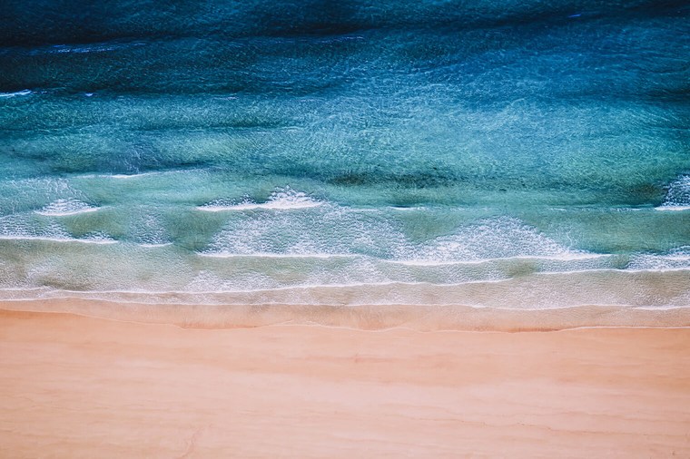 Aerial Photo of Beach with Ocean and Waves
