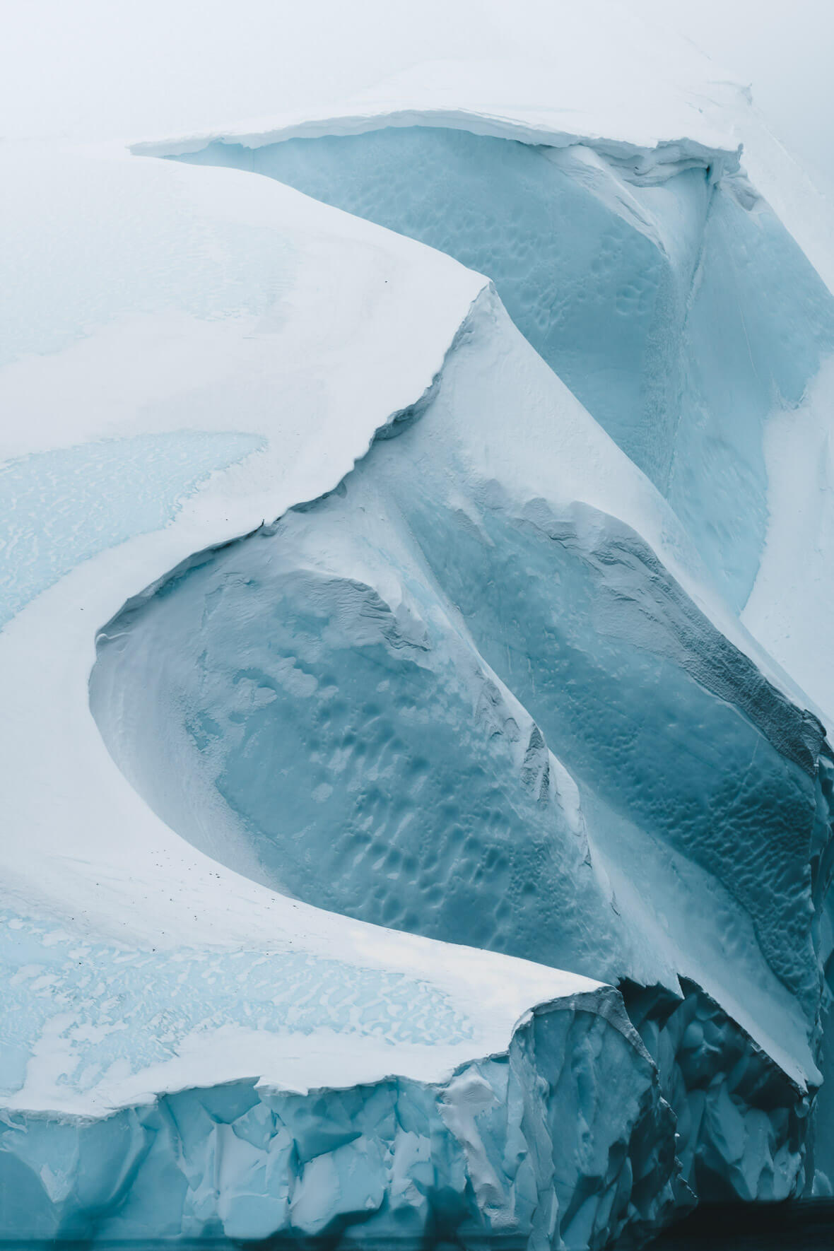 Surreal shapes of an iceberg in the Disko Bay, Greenland