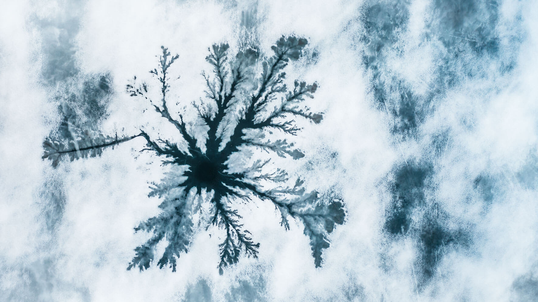 Abstract aerial photography of a frozen lake by Northlandscapes, Jan Erik Waider