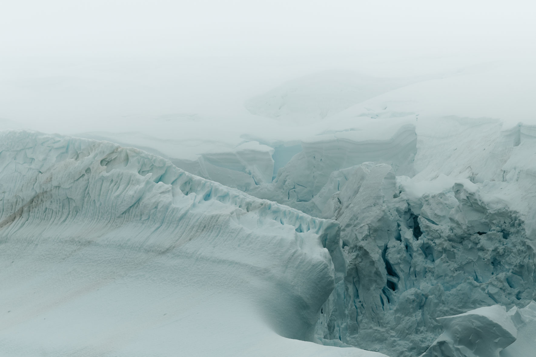 Abstract glacier ice and iceberg (Melchior Islands)