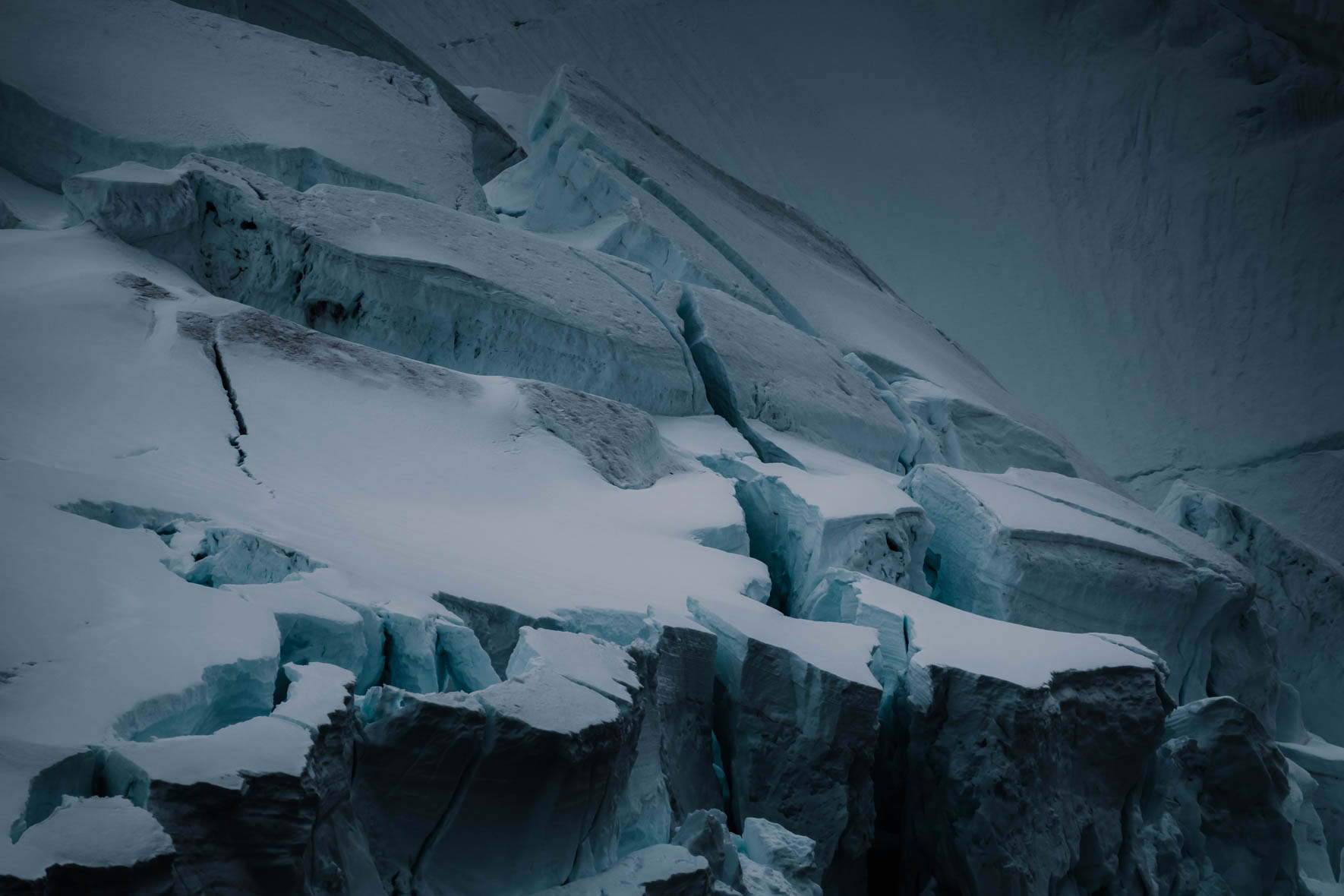 Moody landscape photography of Antarctica with glaciers and crevasses