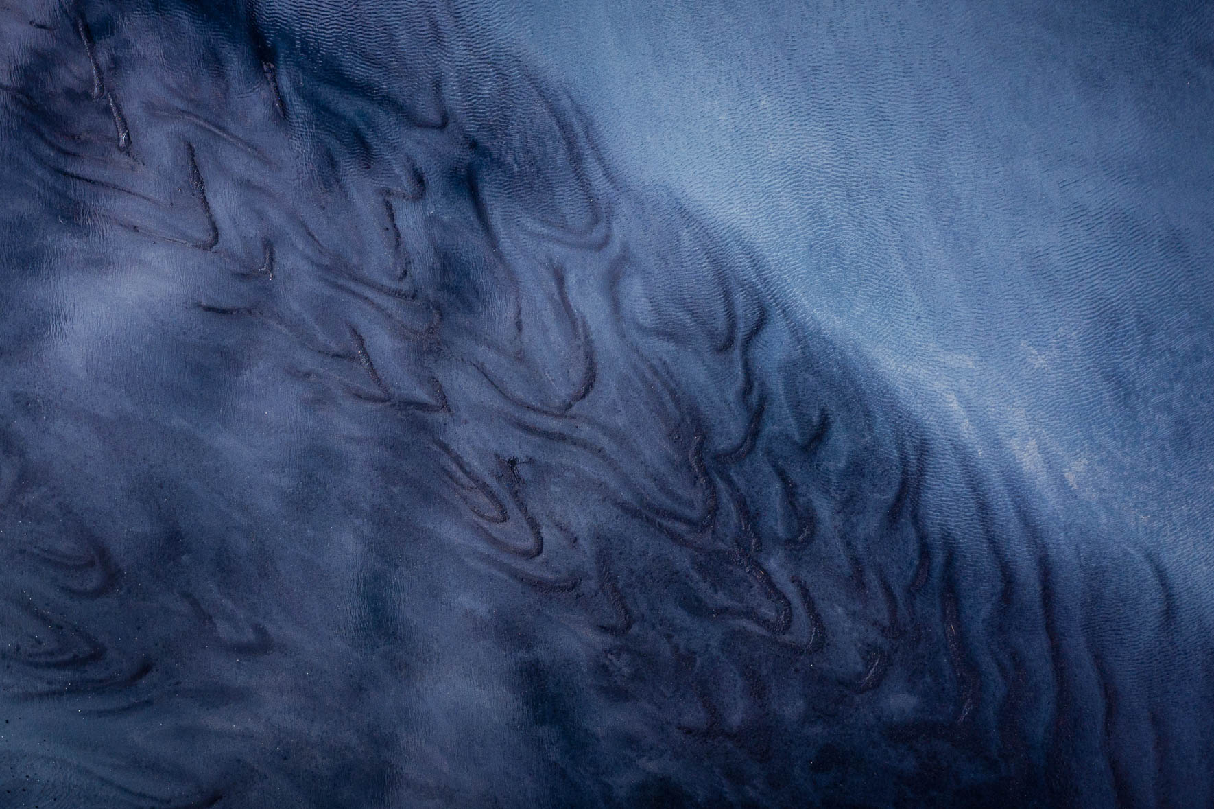 Abstract Tidal Patterns with Black Sand