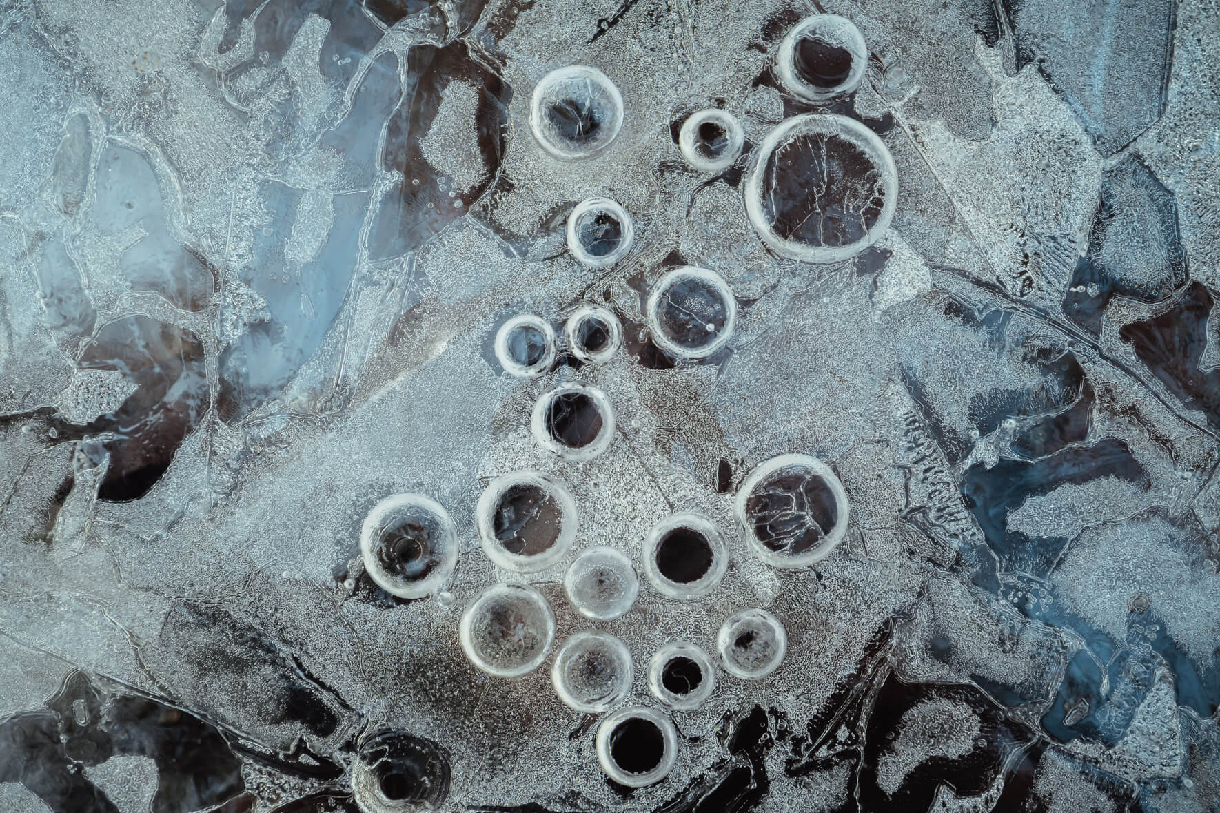 Abstract Macro Photography of Air Bubbles in Frozen Creek