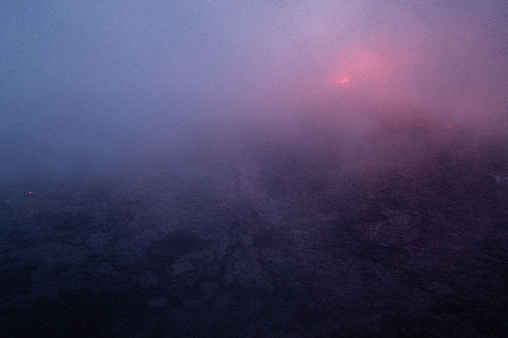 The crater of the eruption on Fagradalsfjall covered in fog and steam