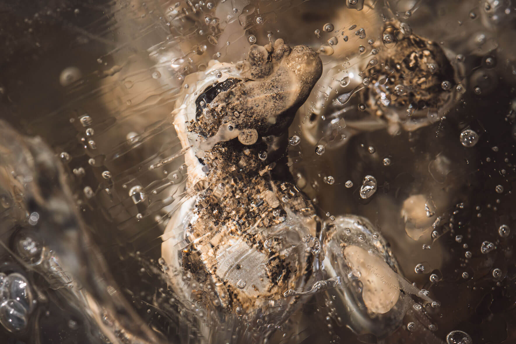 Abstract macro photography of glacier ice with air inclusions in Iceland (Vatnajökull)