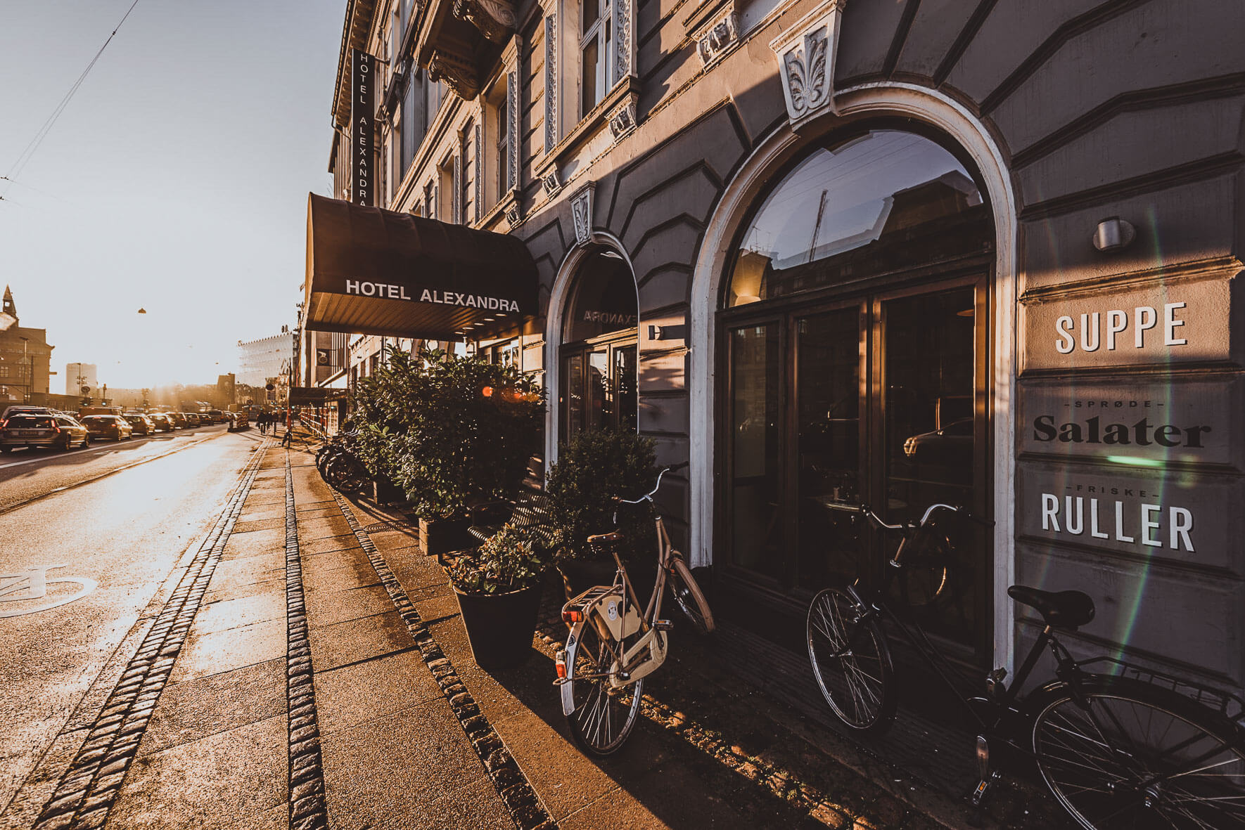 Bikes in front of Hotel Alexandra in Copenhagen in the morning sun