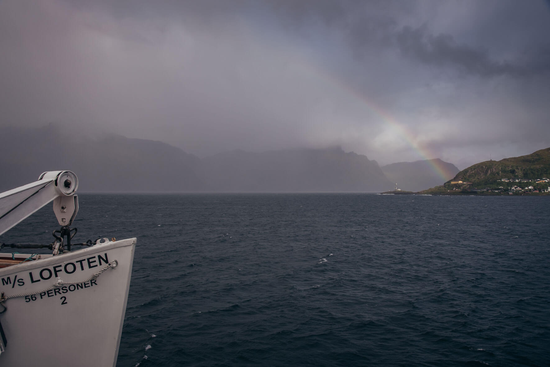Rainbow over MS Lofoten passenger and cargo vessel (Hurtigruten)