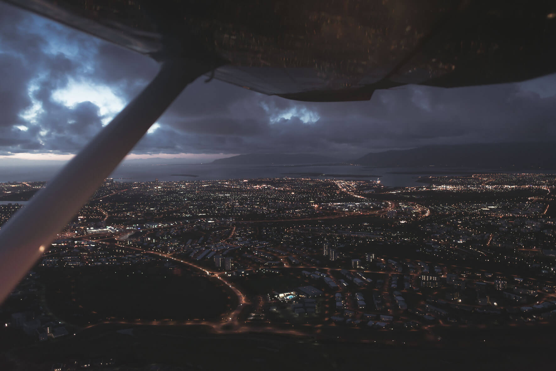 Reykjavík in the evening seen from a Cessna 207 by Eagle Air