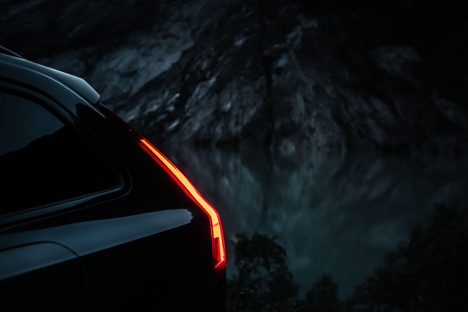 Volvo V90 Cross Country taillights and mountain lake