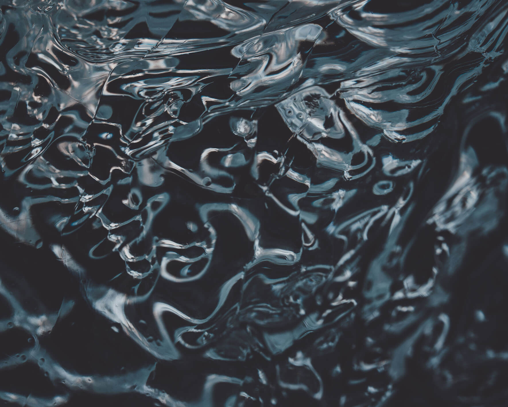 Dark blue glacier ice patterns