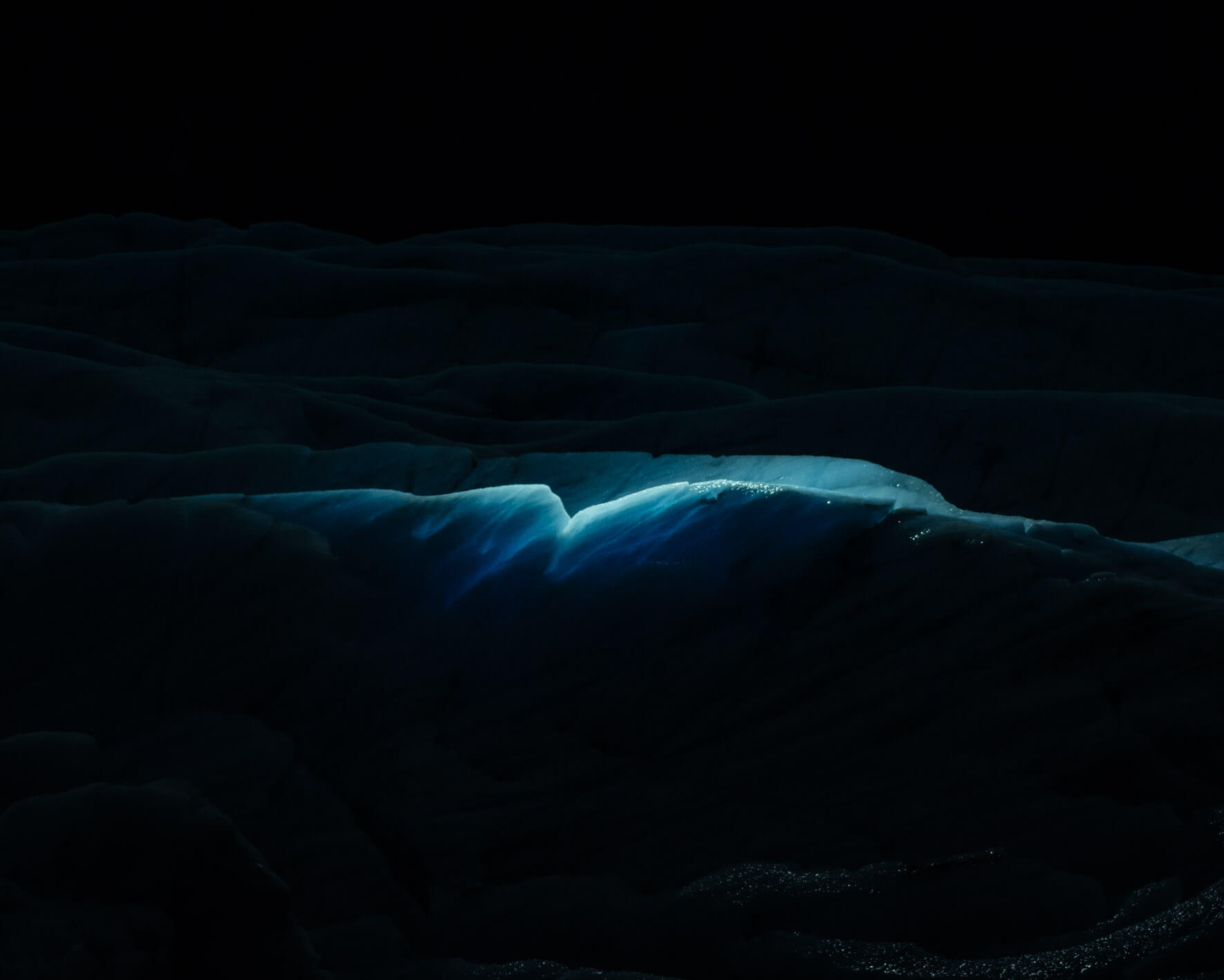 Svínafellsjökul glacier (Iceland) illuminated with aerial LED lights