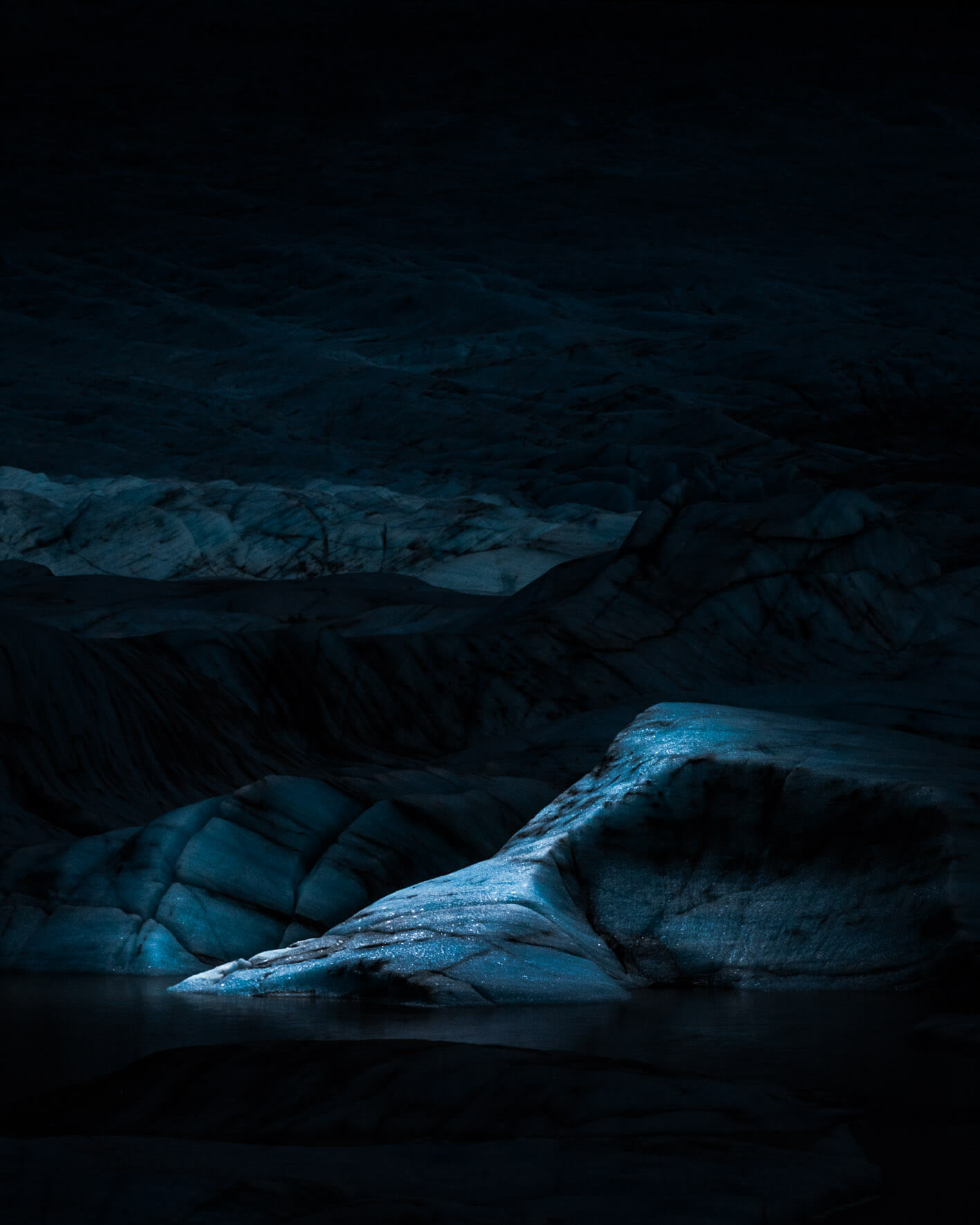 Glacier at night, illuminated with aerial LED lights (DJI Mavic 2 Pro)