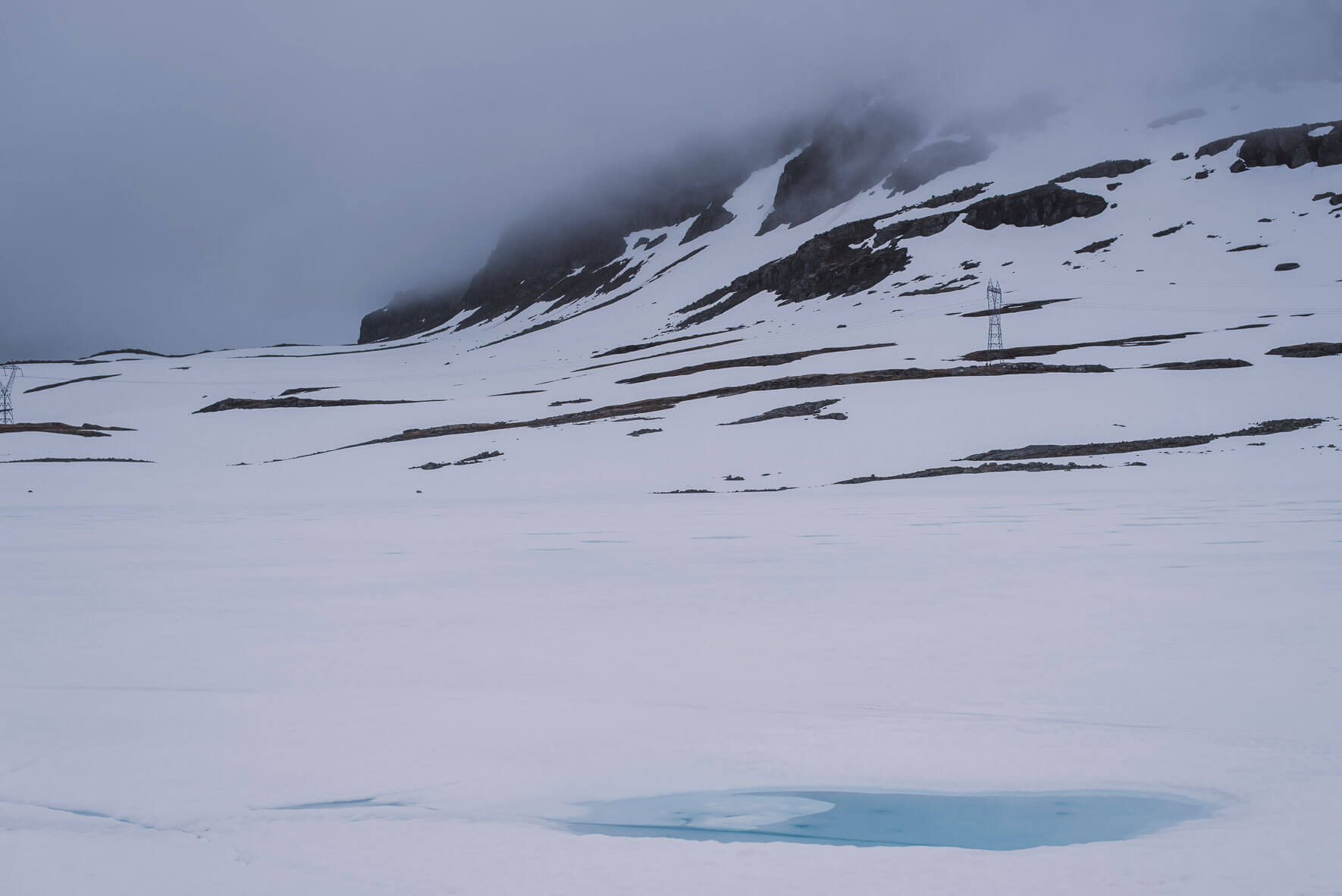 Frozen lake and snow on the Aurlandsfjellet mountains in Norway