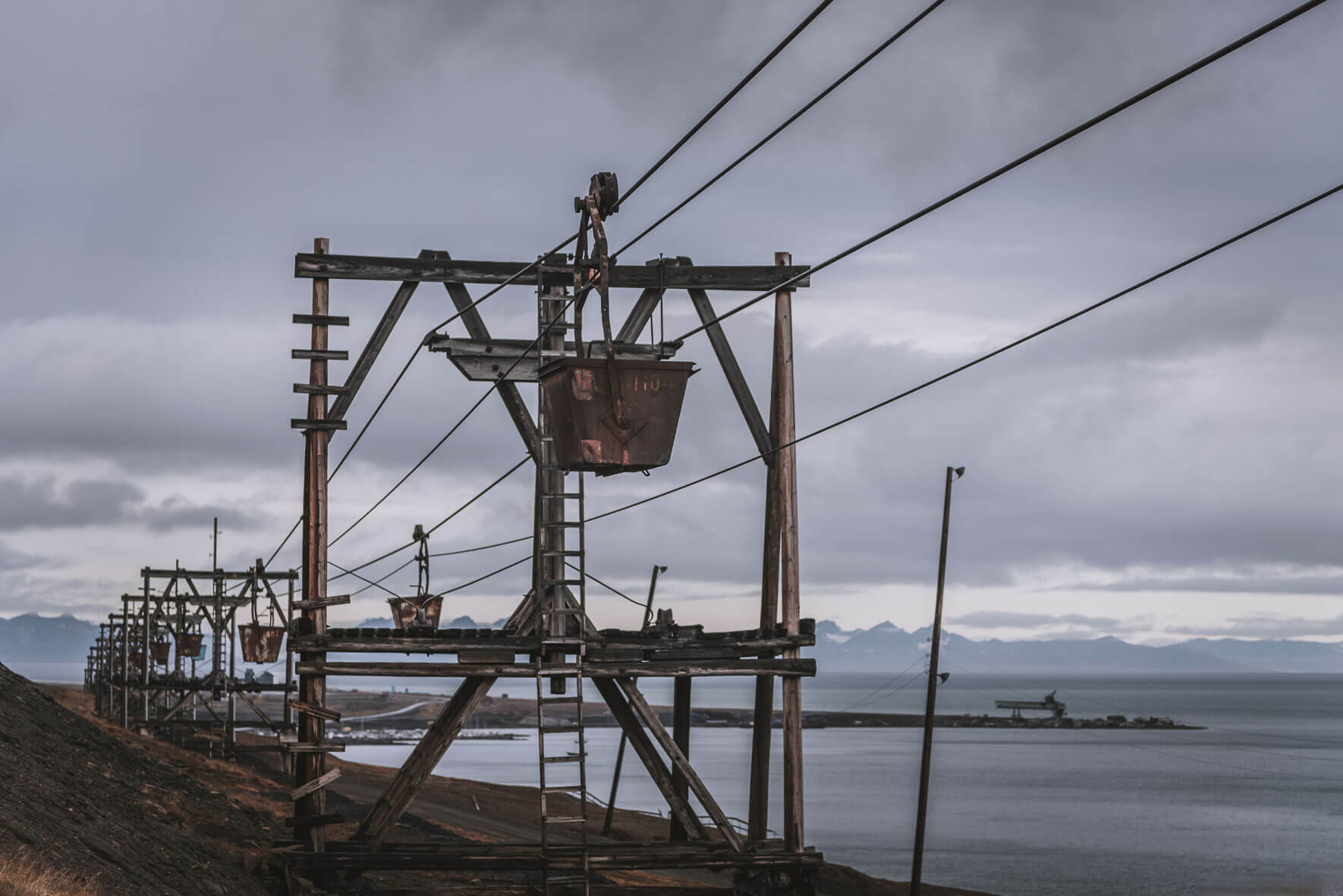 Old coal mining tram line and buckets above Longyearbyen